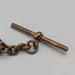 Antique British rolled gold double Albert chain with brass key fob